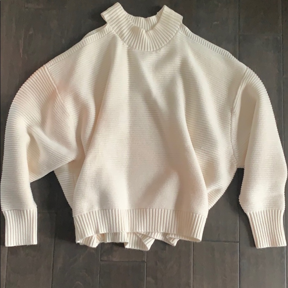 Open shoulder, knit sweater